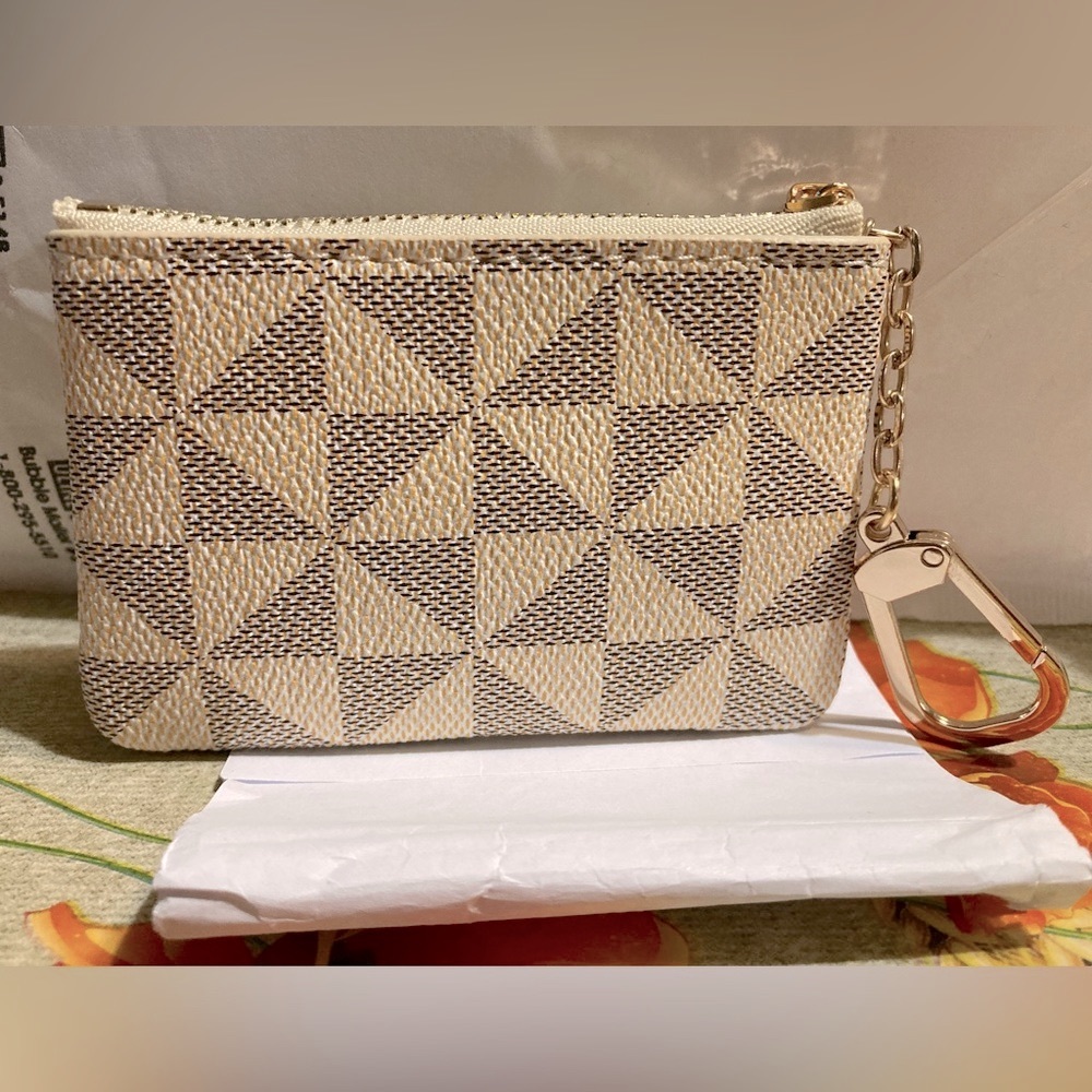 Small tiny coin purse. New